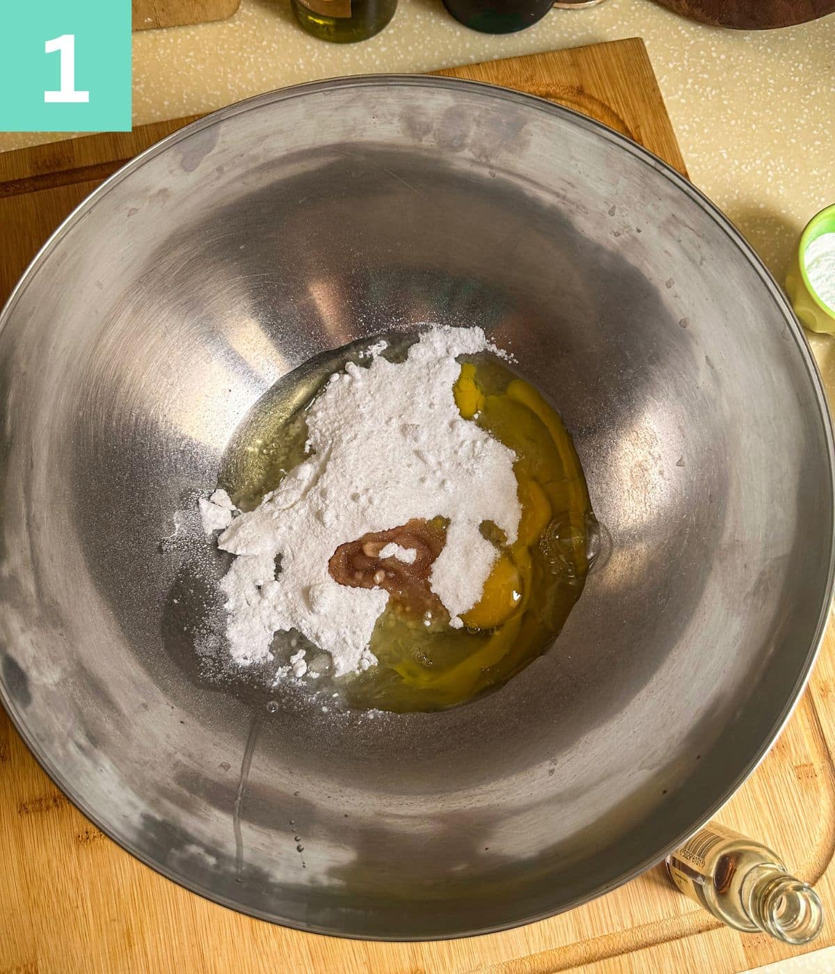 Eggs and sugar in a bowl.