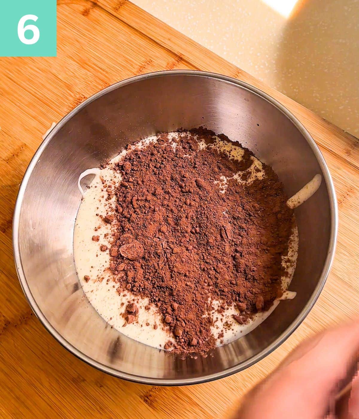 cocoa powder is added to half of the batter.