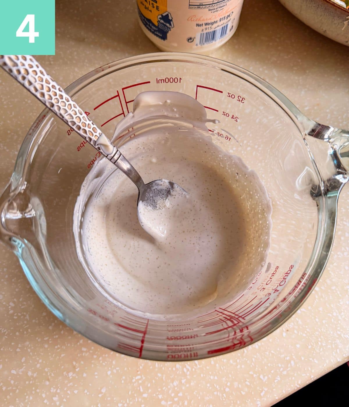 mixing the seasonings, cheese, mayo and cream together.