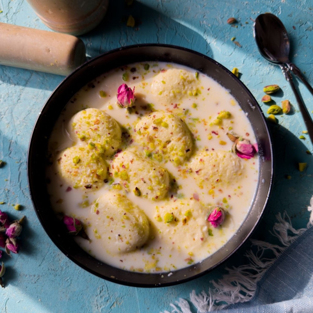 Screenshot of a Pakistani recipe website showing a birth chart beside a rasmalai dish, highlighting creative applications of birth charts for horoscope compatibility