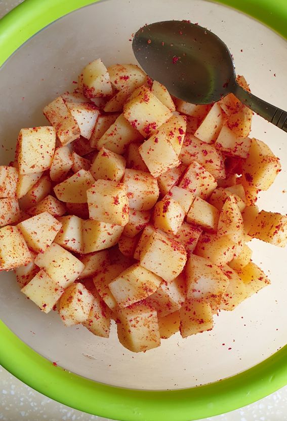 potato cubes rubbed with a spice mix 