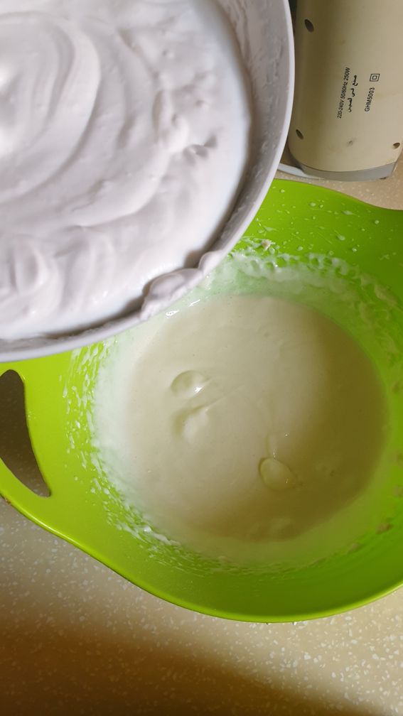 adding whipped cream to the cream cheese mixture
