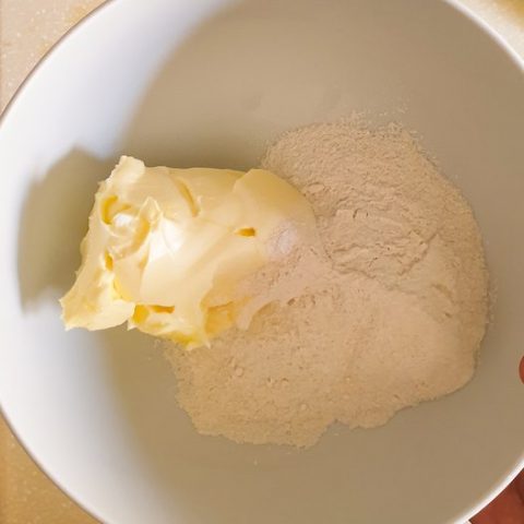 sugar and soft butter in a white bowl