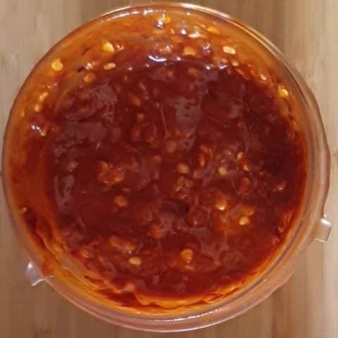 red chili paste in a plastic cup