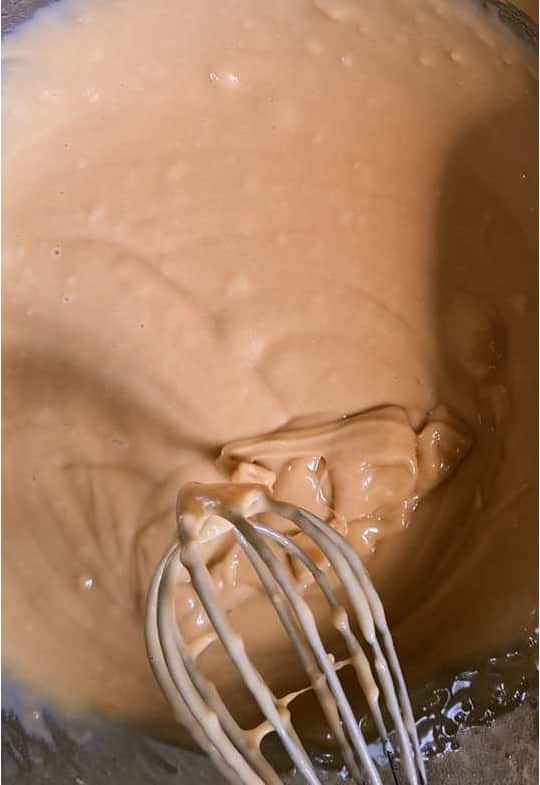 honey cake batter ready to go in the dish