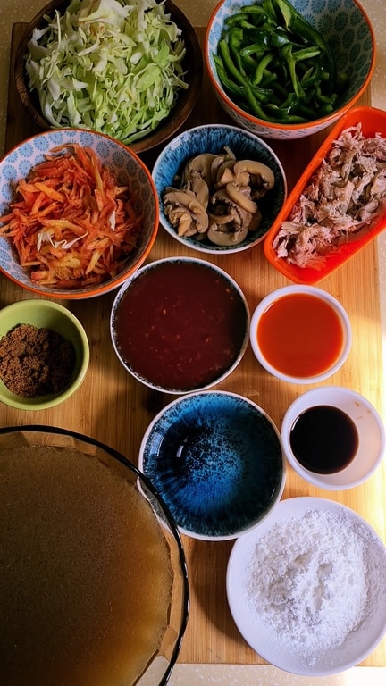 all ingredients shown in different bowls for the soup