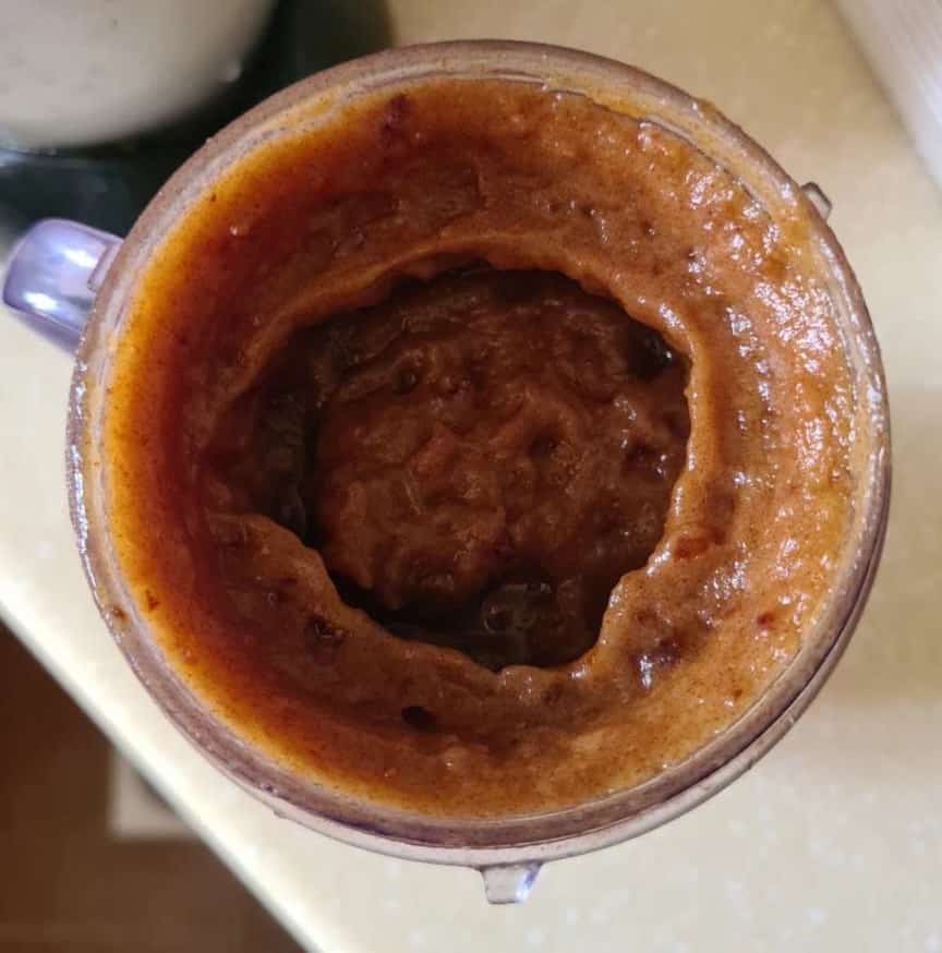 dates made into a paste shown in the blender mug