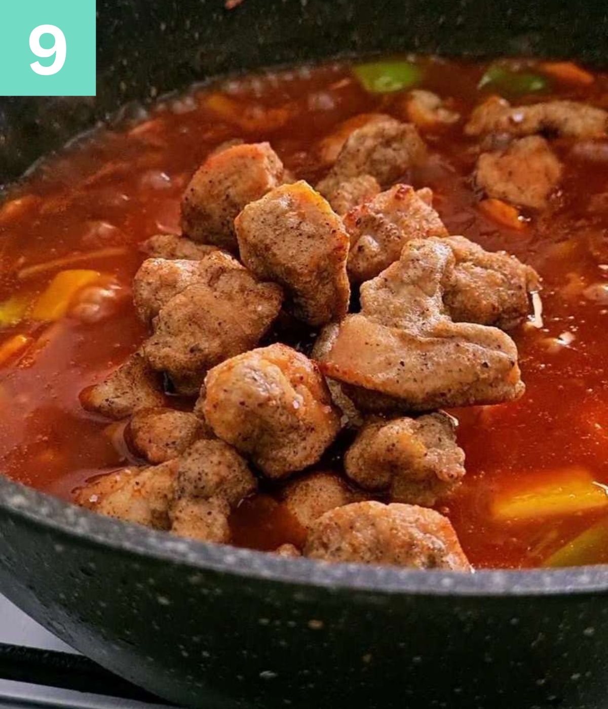 fried chicken added to the pot.