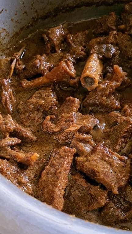 cooked down goat meat curry