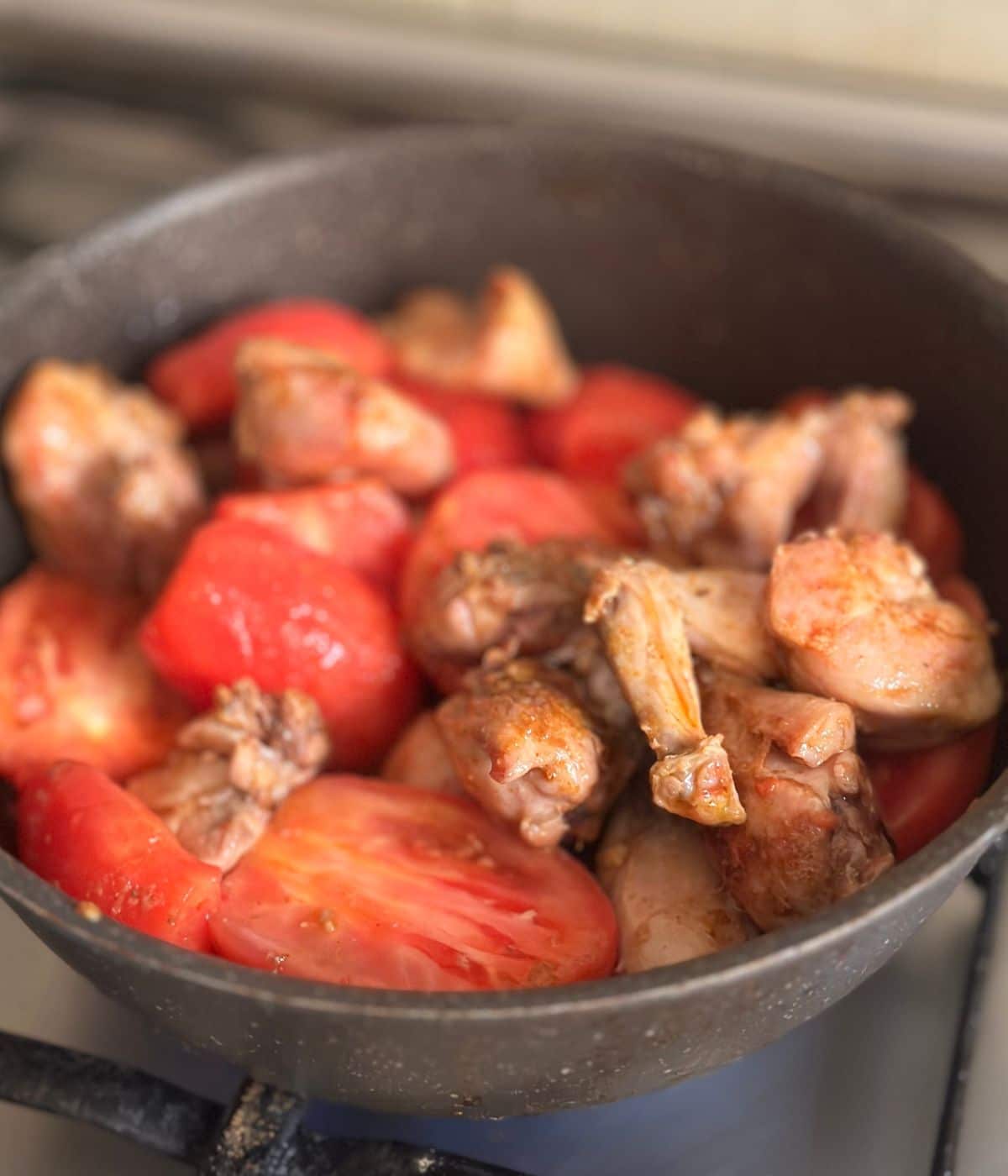 tomatoes added to the chicken