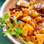 aloo bhujia potato fry served in a dish.
