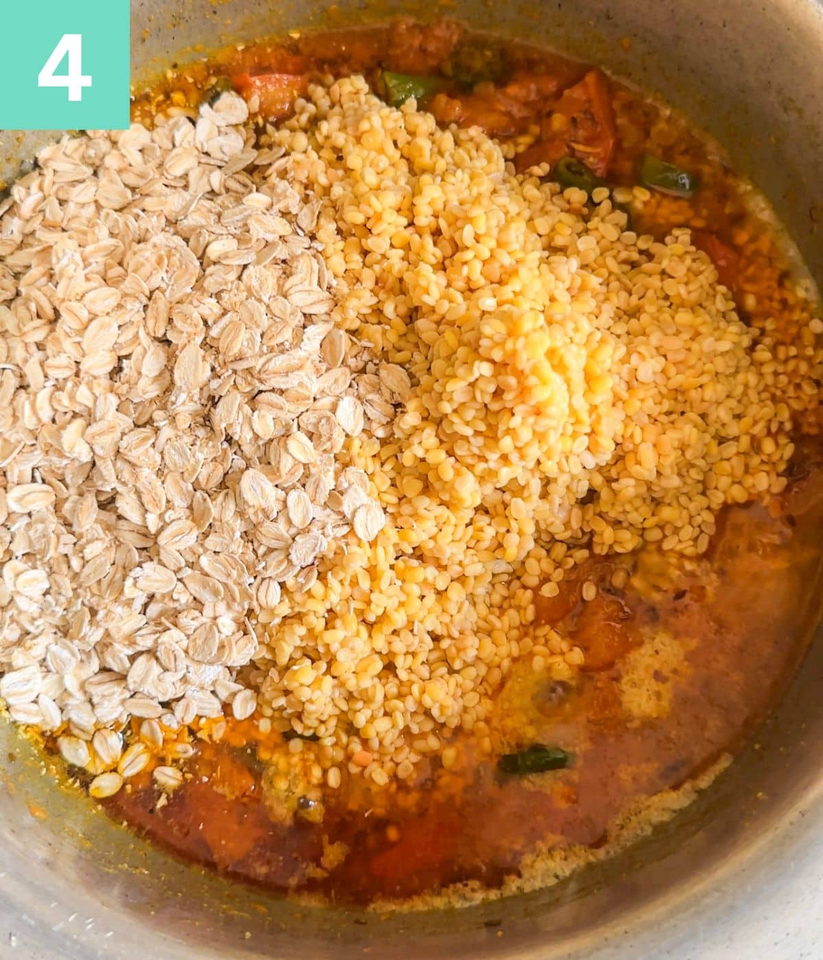 raw yellow lentils and whole oats added to pot.