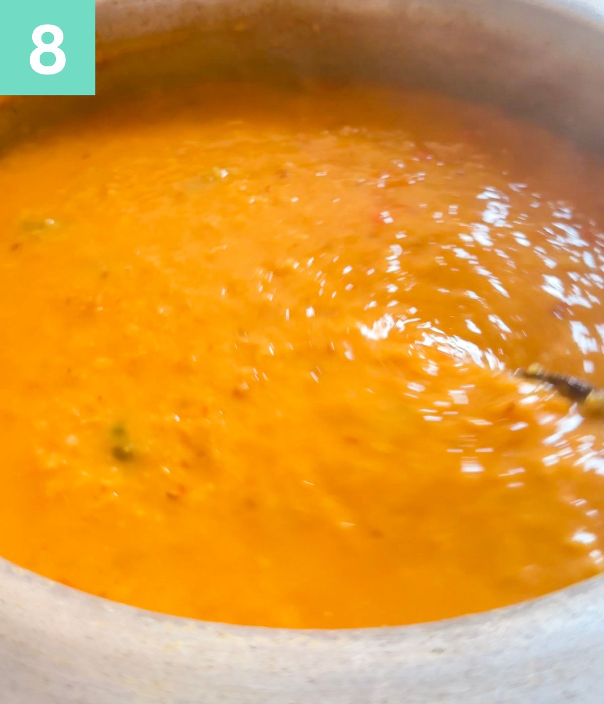 thick khichdi ready in pot.