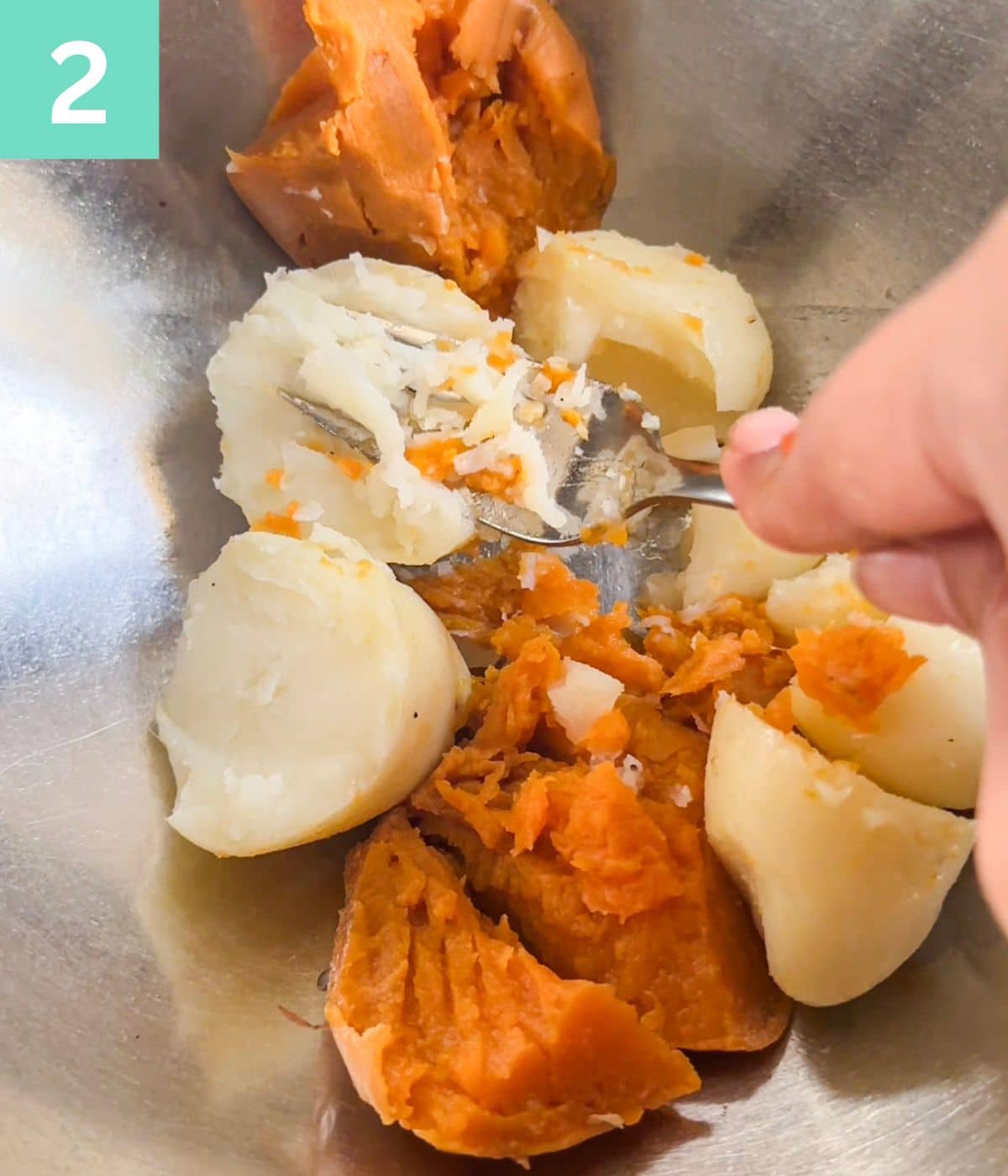 peeled, boiled potatoes in a bowl.