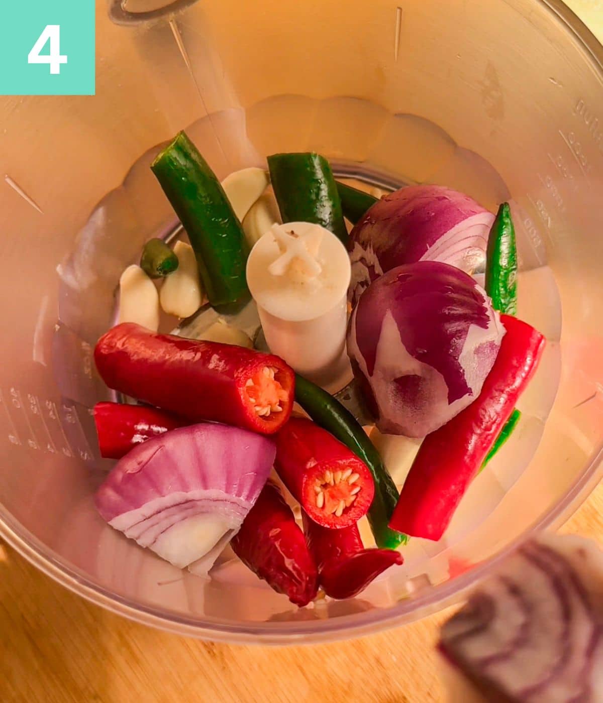 onions, chilies and garlic in a food processor.