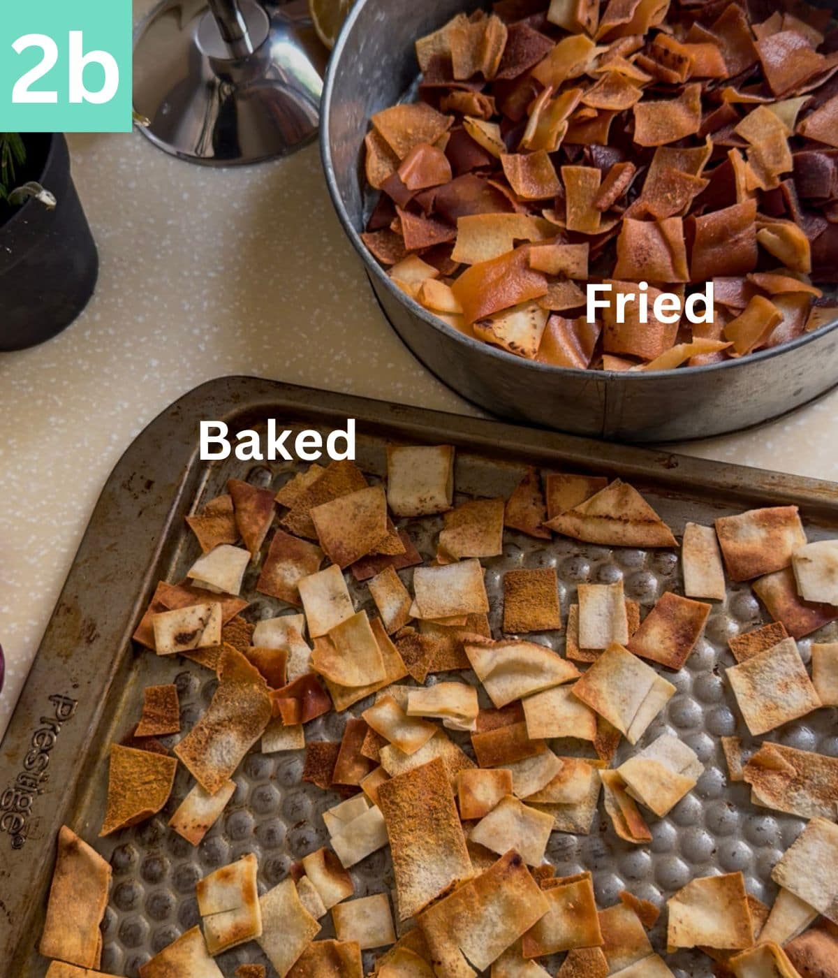 two containers showing fried and baked pita chips.