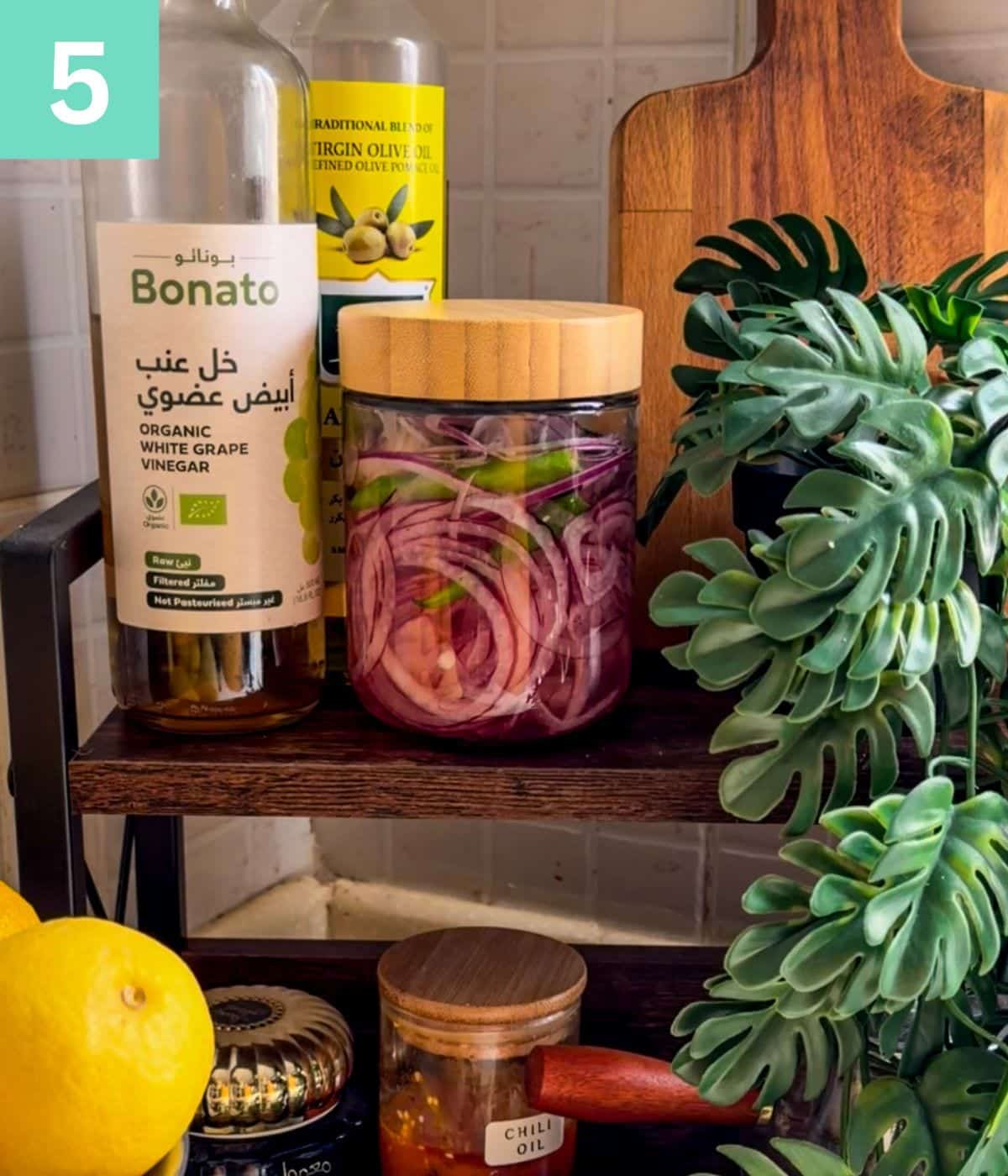 pickled onions on a shelf.